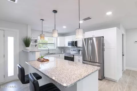 Kitchen - 863 Marvin Rd, Ormond Beach, FL 32176 photo 2 of 4