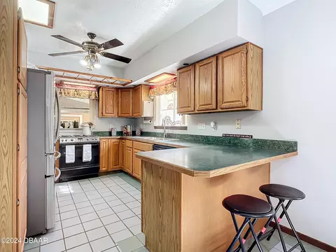 Kitchen - 2940 Ragis Rd, Edgewater, FL 32132 photo 5 of 5