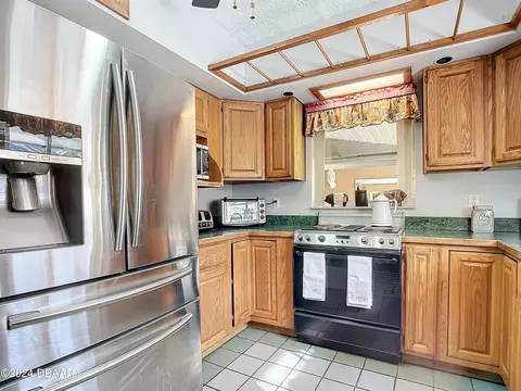Kitchen - 2940 Ragis Rd, Edgewater, FL 32132 photo 3 of 5