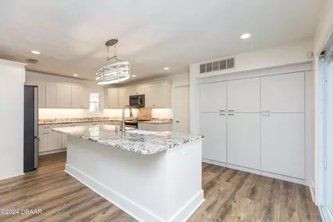 Kitchen - 533 N Halifax Dr, Ormond Beach, FL 32176 photo 4 of 9