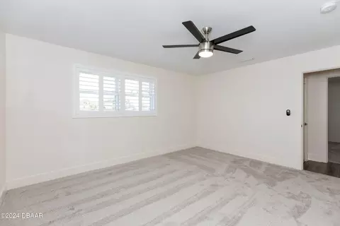 Bedroom - 533 N Halifax Dr, Ormond Beach, FL 32176 photo 5 of 12