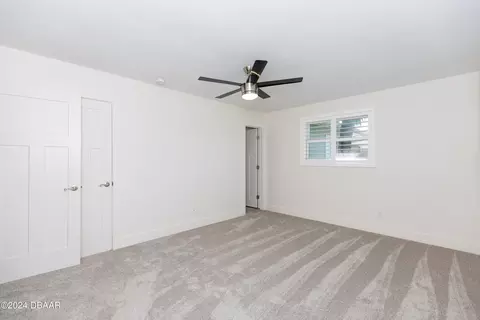 Bedroom - 533 N Halifax Dr, Ormond Beach, FL 32176 photo 7 of 12