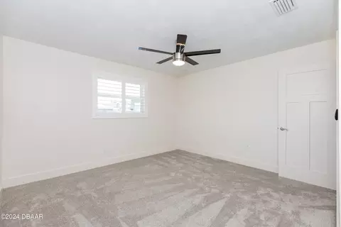 Bedroom - 533 N Halifax Dr, Ormond Beach, FL 32176 photo 12 of 12