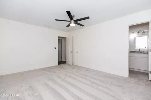 Bedroom - 533 N Halifax Dr, Ormond Beach, FL 32176 photo 8 of 12