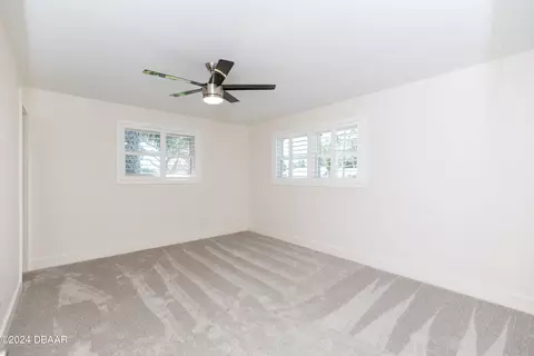 Bedroom - 533 N Halifax Dr, Ormond Beach, FL 32176 photo 6 of 12