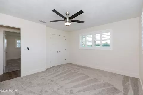 Bedroom - 533 N Halifax Dr, Ormond Beach, FL 32176 photo 10 of 12