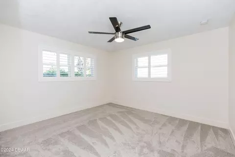 Bedroom - 533 N Halifax Dr, Ormond Beach, FL 32176 photo 9 of 12