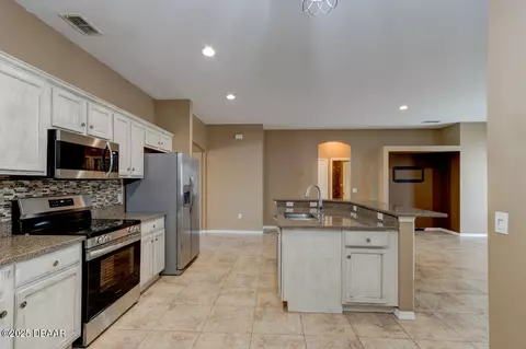 Kitchen - 406 Central Mariners Dr, Edgewater, FL 32141 photo 2 of 3