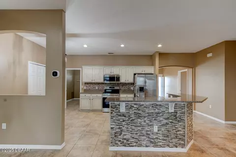 Kitchen - 406 Central Mariners Dr, Edgewater, FL 32141 photo 3 of 3