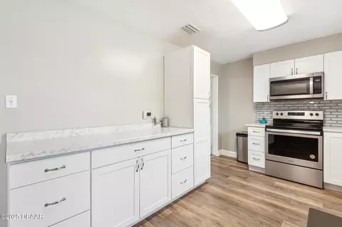 Kitchen - 63 Benjamin Dr, Ormond Beach, FL 32176 photo 2 of 4