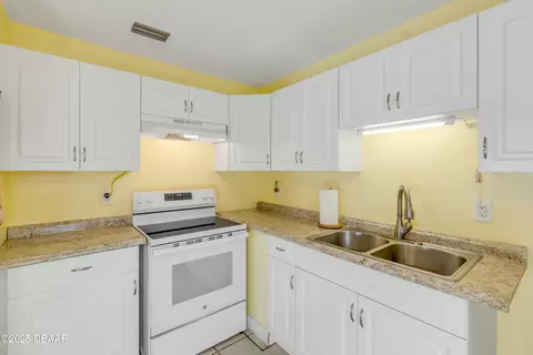 Kitchen - 118 Orange Ave, Edgewater, FL 32132 photo 3 of 4