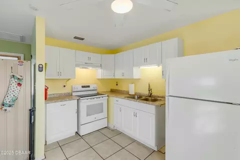 Kitchen - 118 Orange Ave, Edgewater, FL 32132 photo 2 of 4