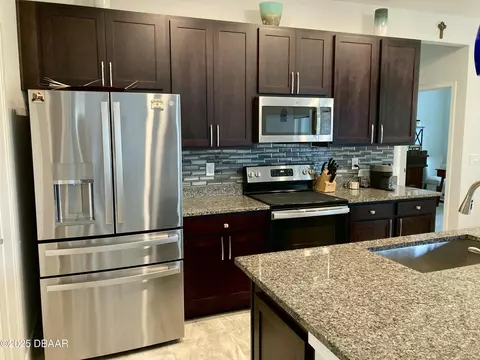 Kitchen - 3079 Silvermines Ave, Ormond Beach, FL 32174 photo 13 of 15