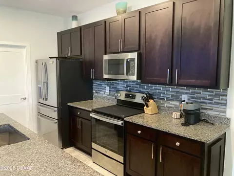 Kitchen - 3079 Silvermines Ave, Ormond Beach, FL 32174 photo 11 of 15