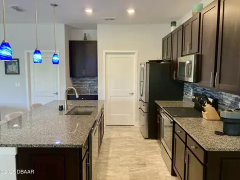 Kitchen - 3079 Silvermines Ave, Ormond Beach, FL 32174 photo 8 of 15