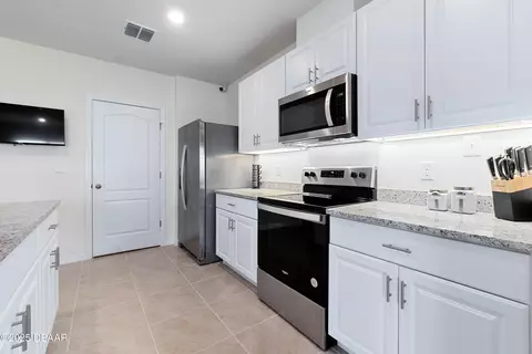 Kitchen - 1314 Middle Lake Dr, Ormond Beach, FL 32174 photo 3 of 4
