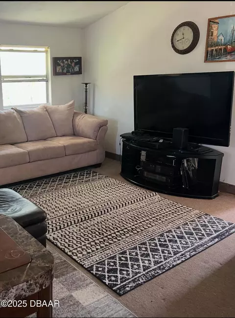 Living - 431 Collins St, Ormond Beach, FL 32174 photo 1 of 2