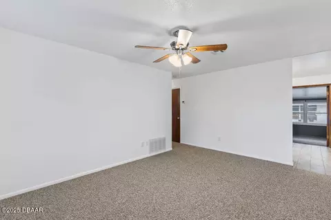 Living - 405 Adele St, Edgewater, FL 32132 photo 2 of 3