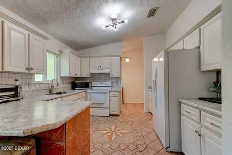 Kitchen - 2914 Sabal Palm Dr, Edgewater, FL 32141 photo 2 of 2