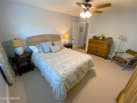 Bedroom - 406 N Halifax Dr, Ormond Beach, FL 32176 photo 6 of 9