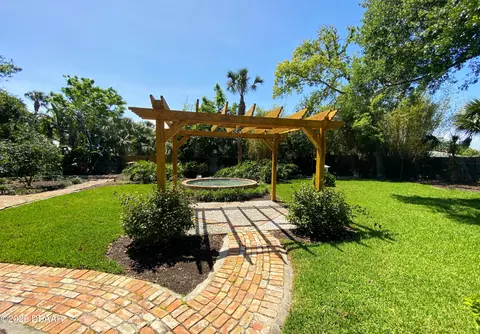 Exterior - 406 N Halifax Dr, Ormond Beach, FL 32176 photo 9 of 24