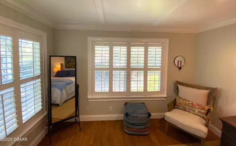 Bedroom - 406 N Halifax Dr, Ormond Beach, FL 32176 photo 4 of 9