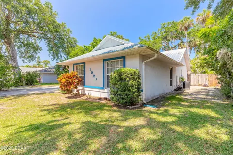 Exterior - 1927 Orange Tree Dr, Edgewater, FL 32141 photo 5 of 16
