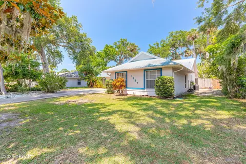 Exterior - 1927 Orange Tree Dr, Edgewater, FL 32141 photo 9 of 16