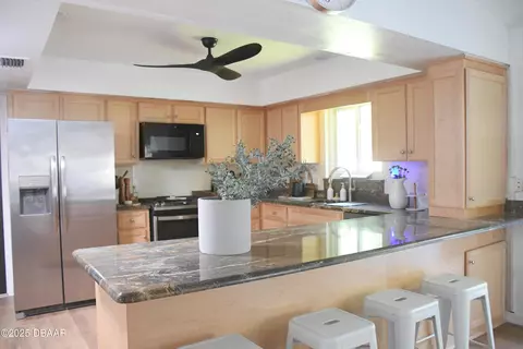 Kitchen - 84 S St Andrews Dr, Ormond Beach, FL 32174 photo 1 of 4