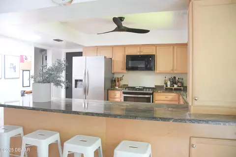 Kitchen - 84 S St Andrews Dr, Ormond Beach, FL 32174 photo 4 of 4