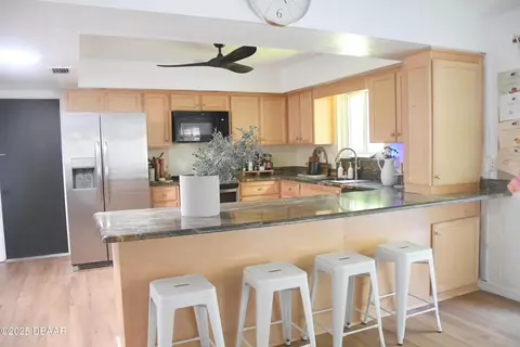 Kitchen - 84 S St Andrews Dr, Ormond Beach, FL 32174 photo 3 of 4
