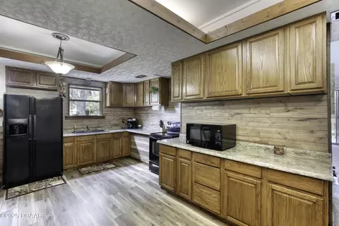 Kitchen - 233 Riverbend Rd, Ormond Beach, FL 32174 photo 2 of 3