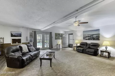 Living - 233 Riverbend Rd, Ormond Beach, FL 32174 photo 1 of 5