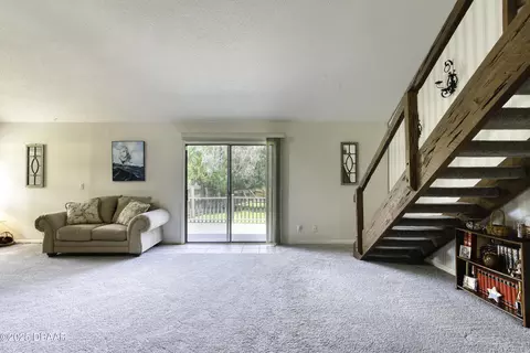 Living - 233 Riverbend Rd, Ormond Beach, FL 32174 photo 3 of 5