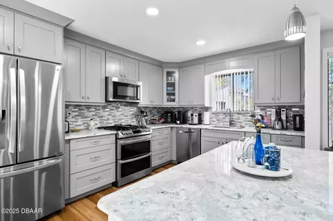 Kitchen - 229 Pine Cone Trl, Ormond Beach, FL 32174 photo 11 of 14