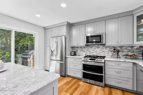 Kitchen - 229 Pine Cone Trl, Ormond Beach, FL 32174 photo 10 of 14