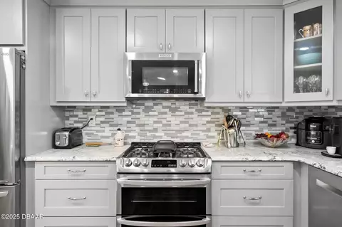 Kitchen - 229 Pine Cone Trl, Ormond Beach, FL 32174 photo 5 of 14