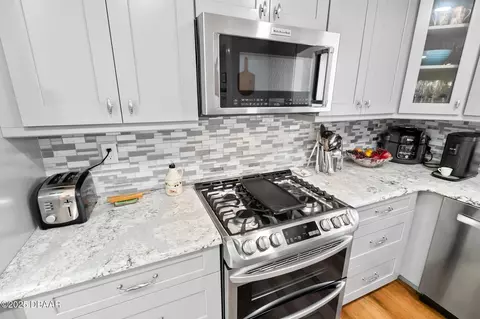 Kitchen - 229 Pine Cone Trl, Ormond Beach, FL 32174 photo 7 of 14