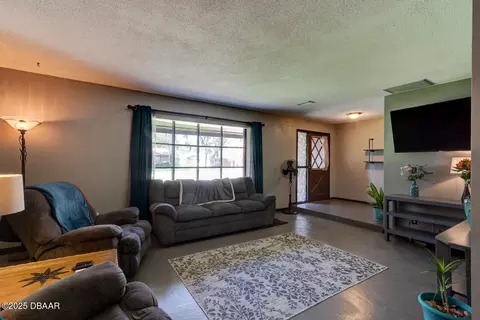 Living - 35 Whippoorwill Ln, Ormond Beach, FL 32174 photo 1 of 4