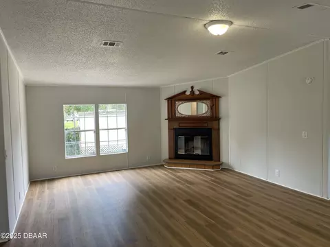 Living - 1910 Woodcrest Dr, Ormond Beach, FL 32174 photo 1 of 5