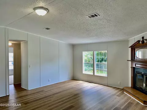 Living - 1910 Woodcrest Dr, Ormond Beach, FL 32174 photo 2 of 5