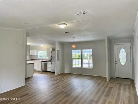 Living - 1910 Woodcrest Dr, Ormond Beach, FL 32174 photo 4 of 5