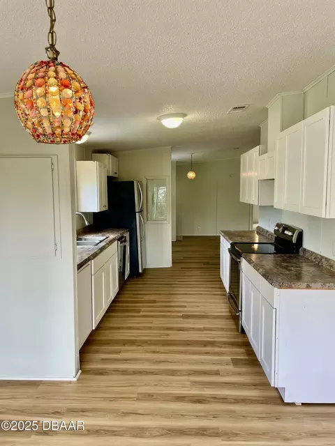 Kitchen - 1910 Woodcrest Dr, Ormond Beach, FL 32174 photo 2 of 2