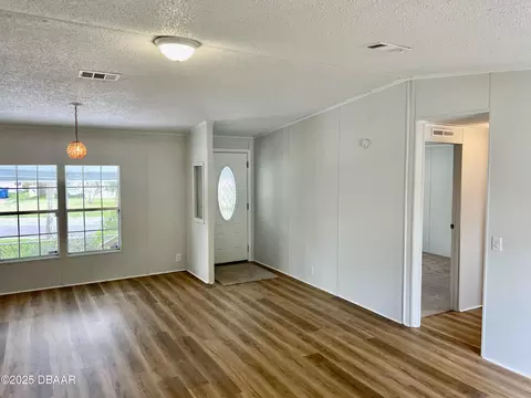 Living - 1910 Woodcrest Dr, Ormond Beach, FL 32174 photo 3 of 5