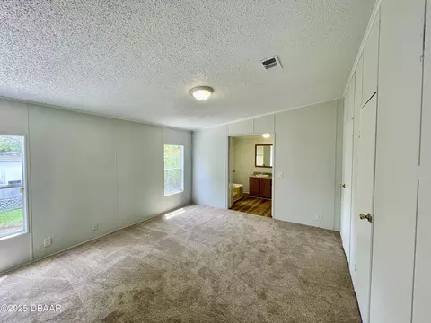 Bedroom - 1910 Woodcrest Dr, Ormond Beach, FL 32174 photo 1 of 6