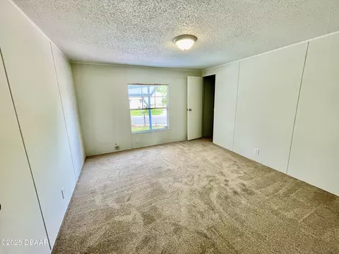 Bedroom - 1910 Woodcrest Dr, Ormond Beach, FL 32174 photo 3 of 6
