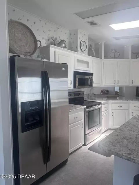 Kitchen - 69 Turquoise Ave, Naples, FL 34114 photo 2 of 3