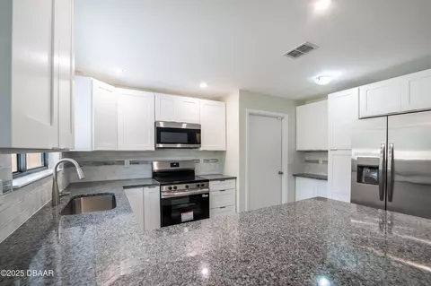 Kitchen - 170 Dix Ave, Ormond Beach, FL 32174 photo 2 of 3
