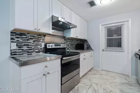 Kitchen - 999 16th St, Edgewater, FL 32132 photo 2 of 4