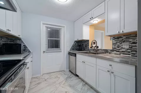 Kitchen - 999 16th St, Edgewater, FL 32132 photo 3 of 4